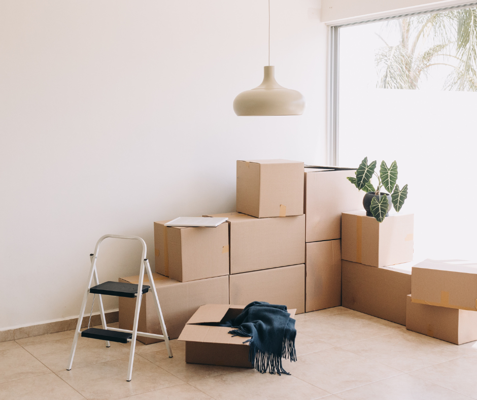 Moving boxes as a tenant moves into a rental home